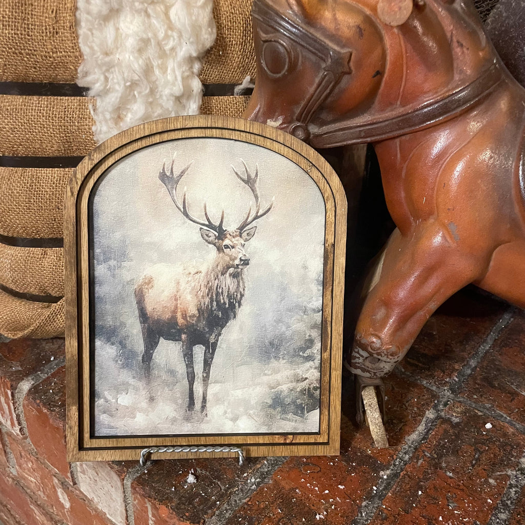 Reindeer in Snowy Woods framed in Arch Frame