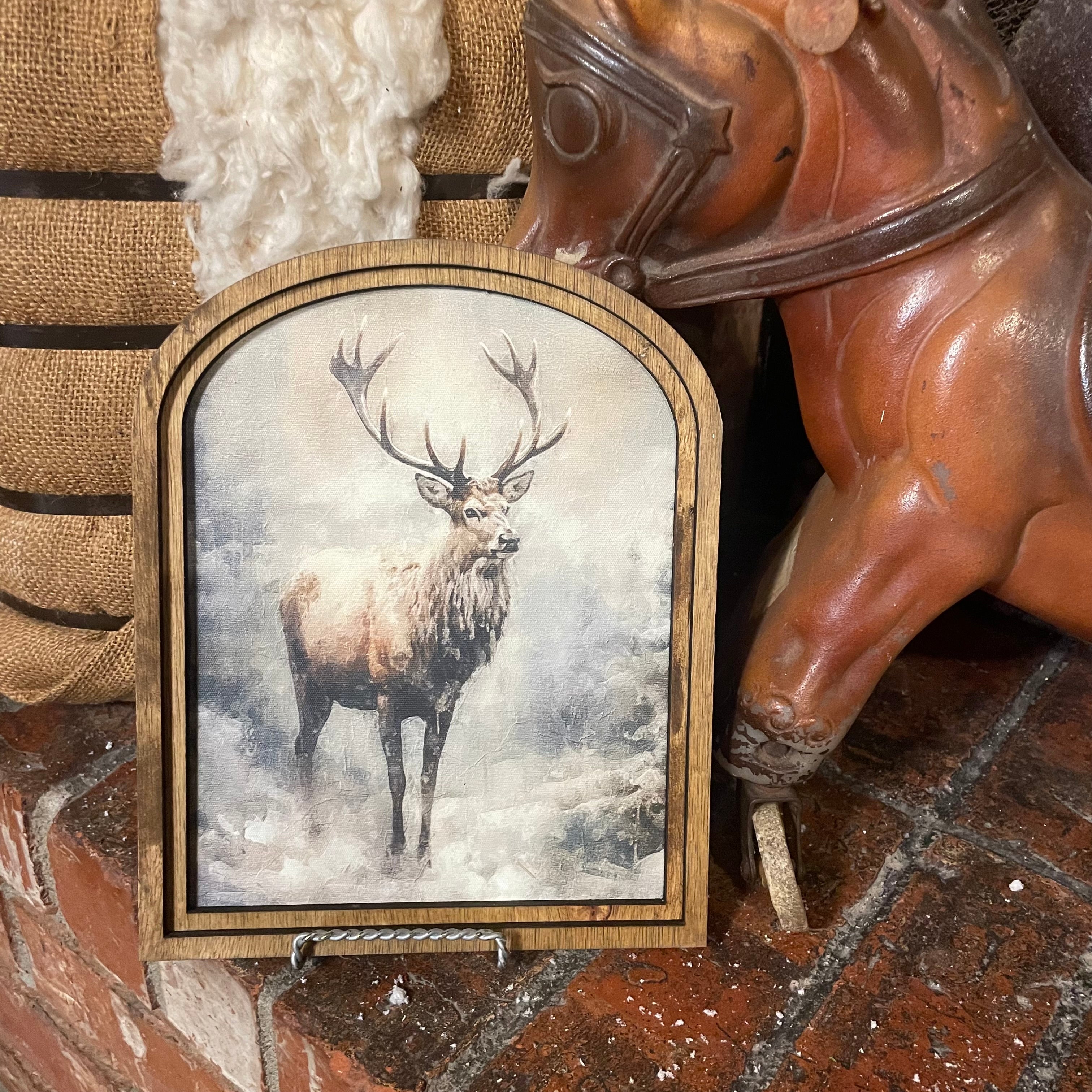 Reindeer in Snowy Woods framed in Arch Frame