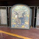 Highland Cow with flowers Canvas Print in Arched Frame