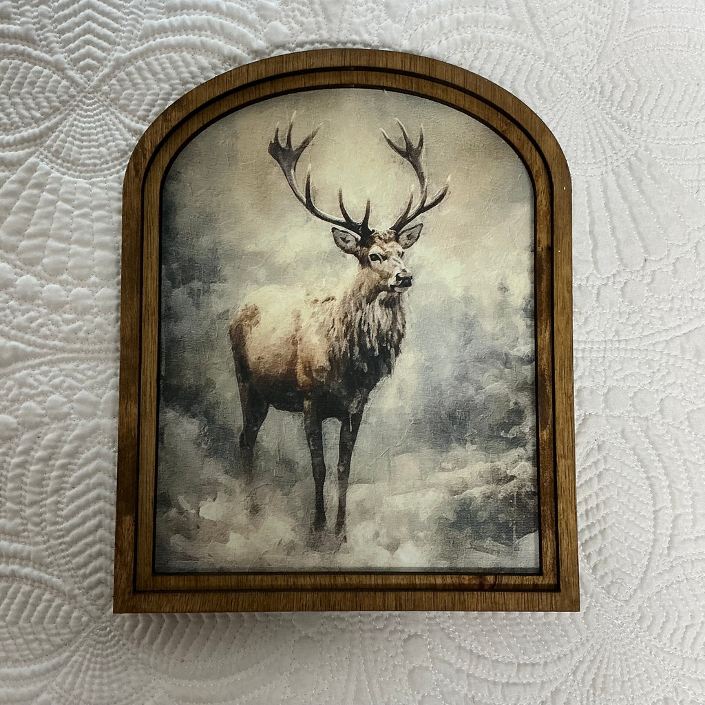 Reindeer in Snowy Woods framed in Arch Frame