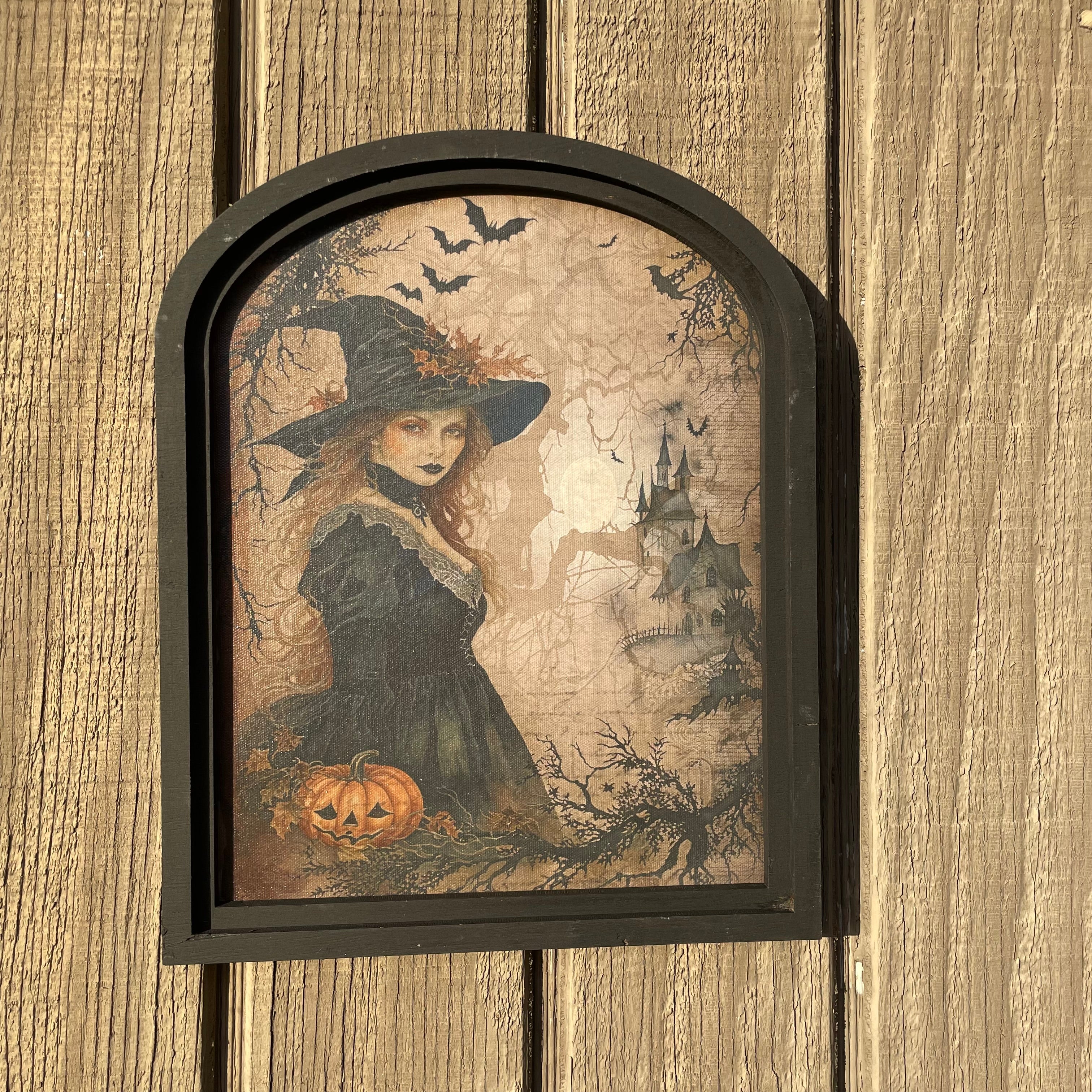 Witch in forest with castle canvas print in small arch