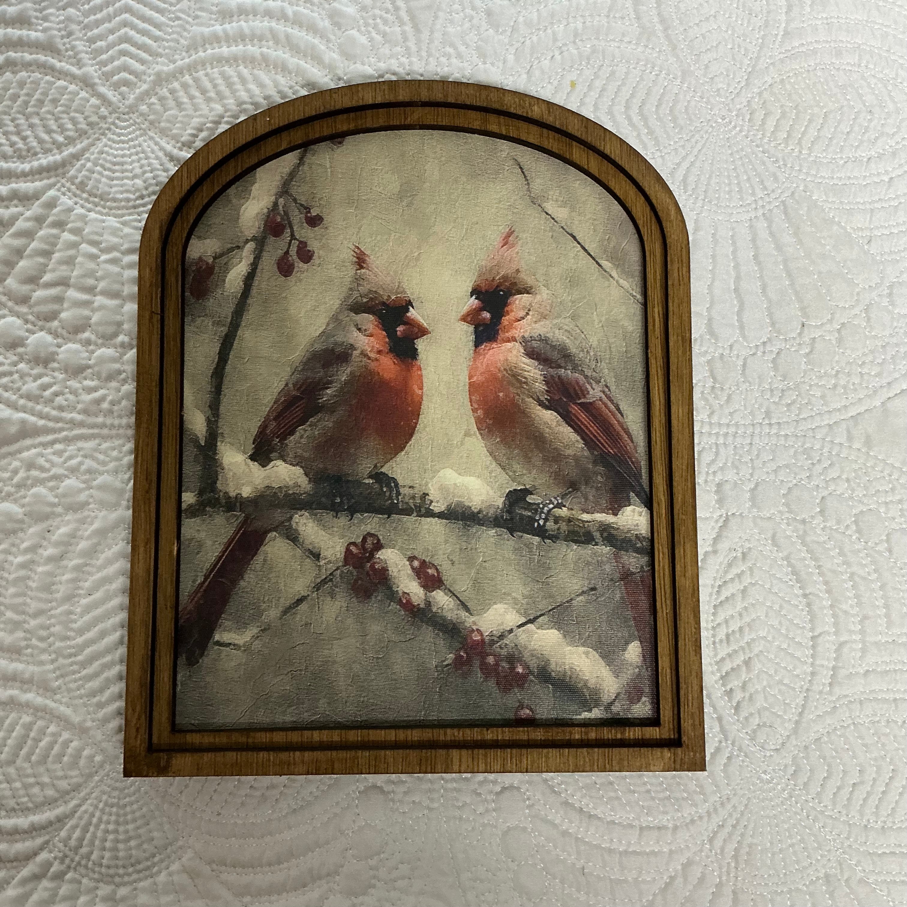 Cardinals on snow branch framed in Arched Frame