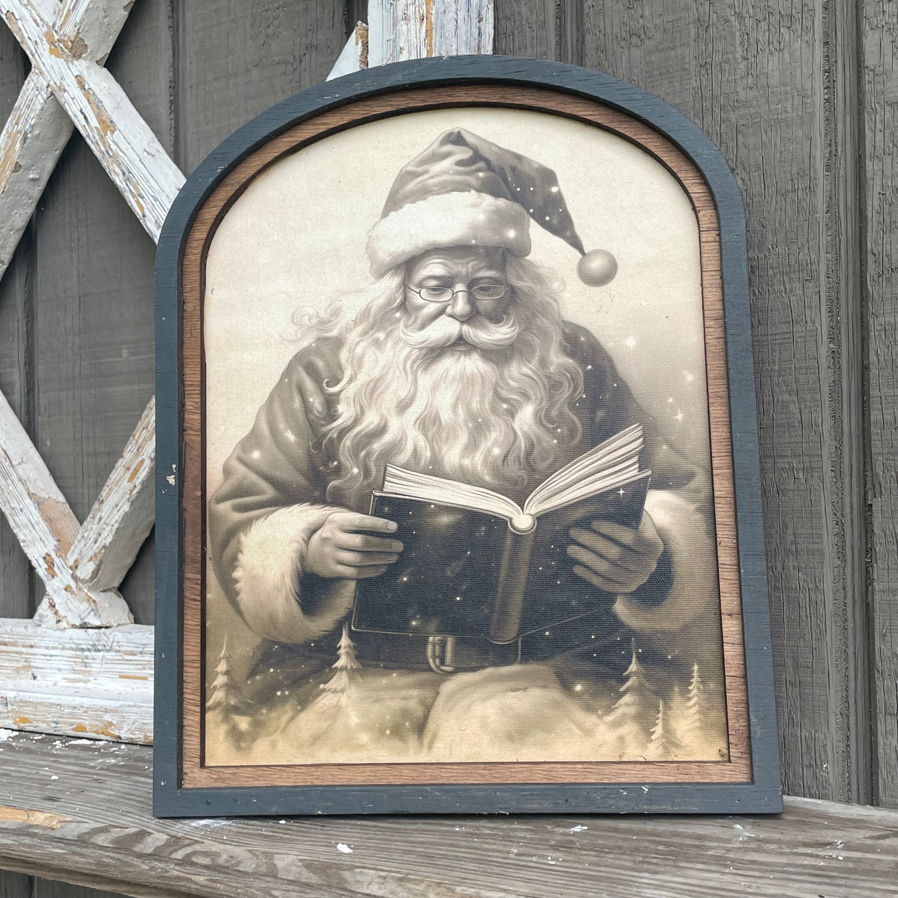 Vintage Santa Clause reading in small arch double frame