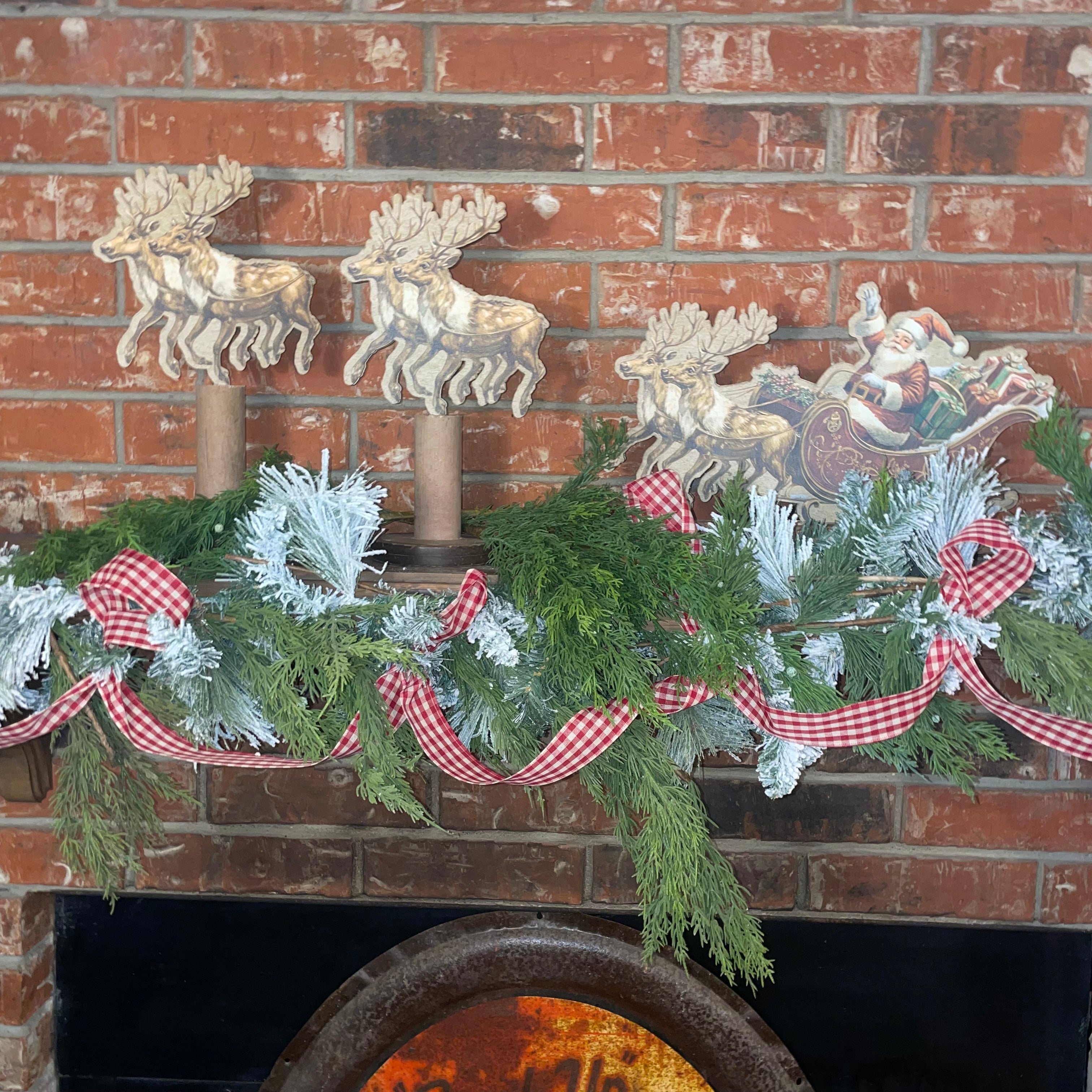 Santa in Sleigh with Flying Reindeer on Vintage Bobbins
