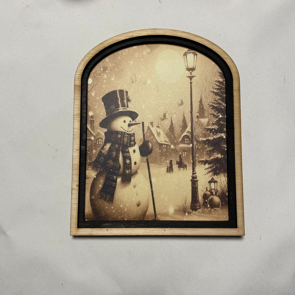 Snowman in Village with Horse and Lamp post framed print