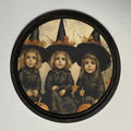 Three witches at Witch Academy Print in round frame