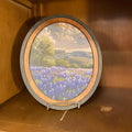 Bluebonnets Plateau Canvas Print framed in Oval Frame