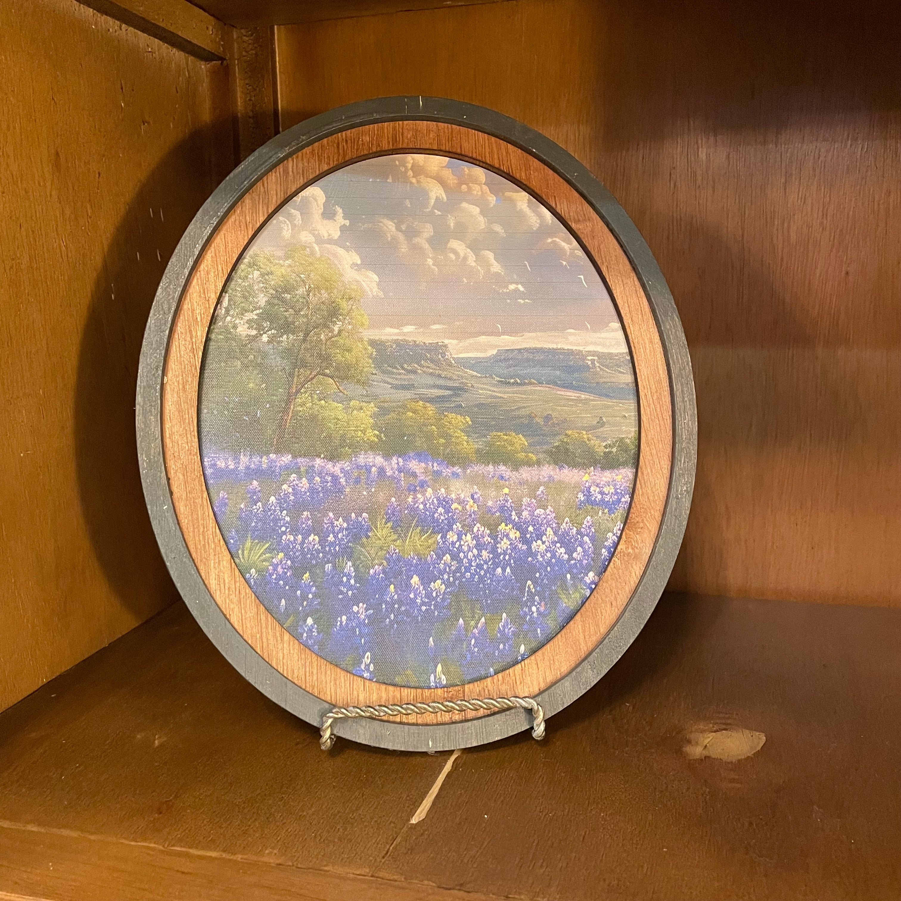 Bluebonnets Plateau Canvas Print framed in Oval Frame