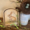Bunny in field of grass canvas in Small Arch Frame
