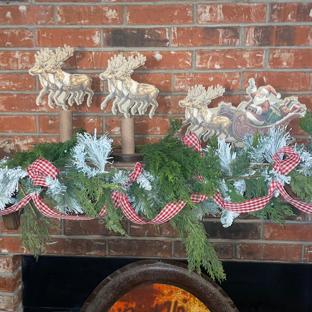 Santa in Sleigh with Flying Reindeer on Vintage Bobbins