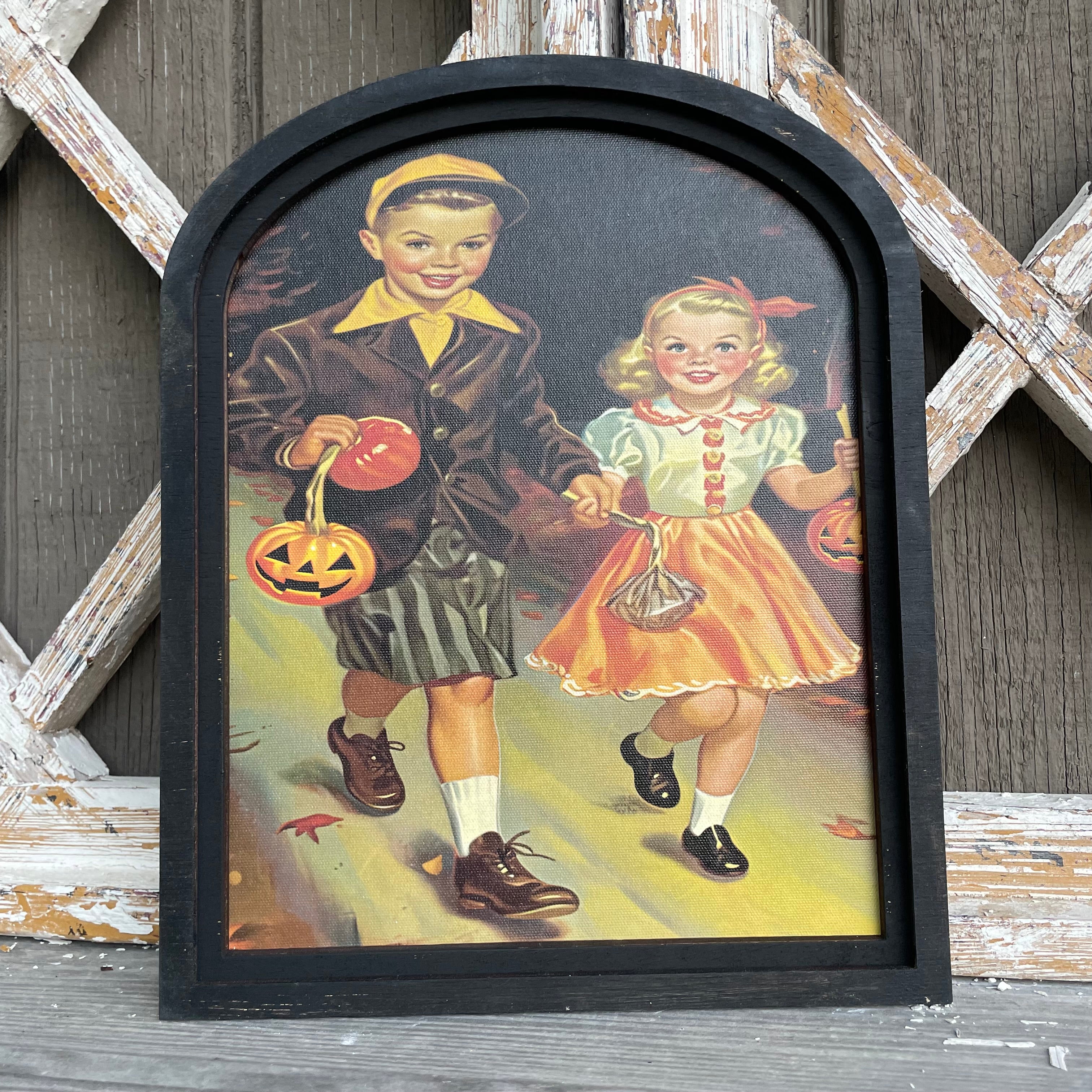 Trick or Treat Boy and Girl canvas print in small arch