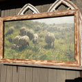 Lambs Grazing on a Hillside Canvas print framed
