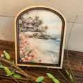Cottage on the Beach with Pink Flowers