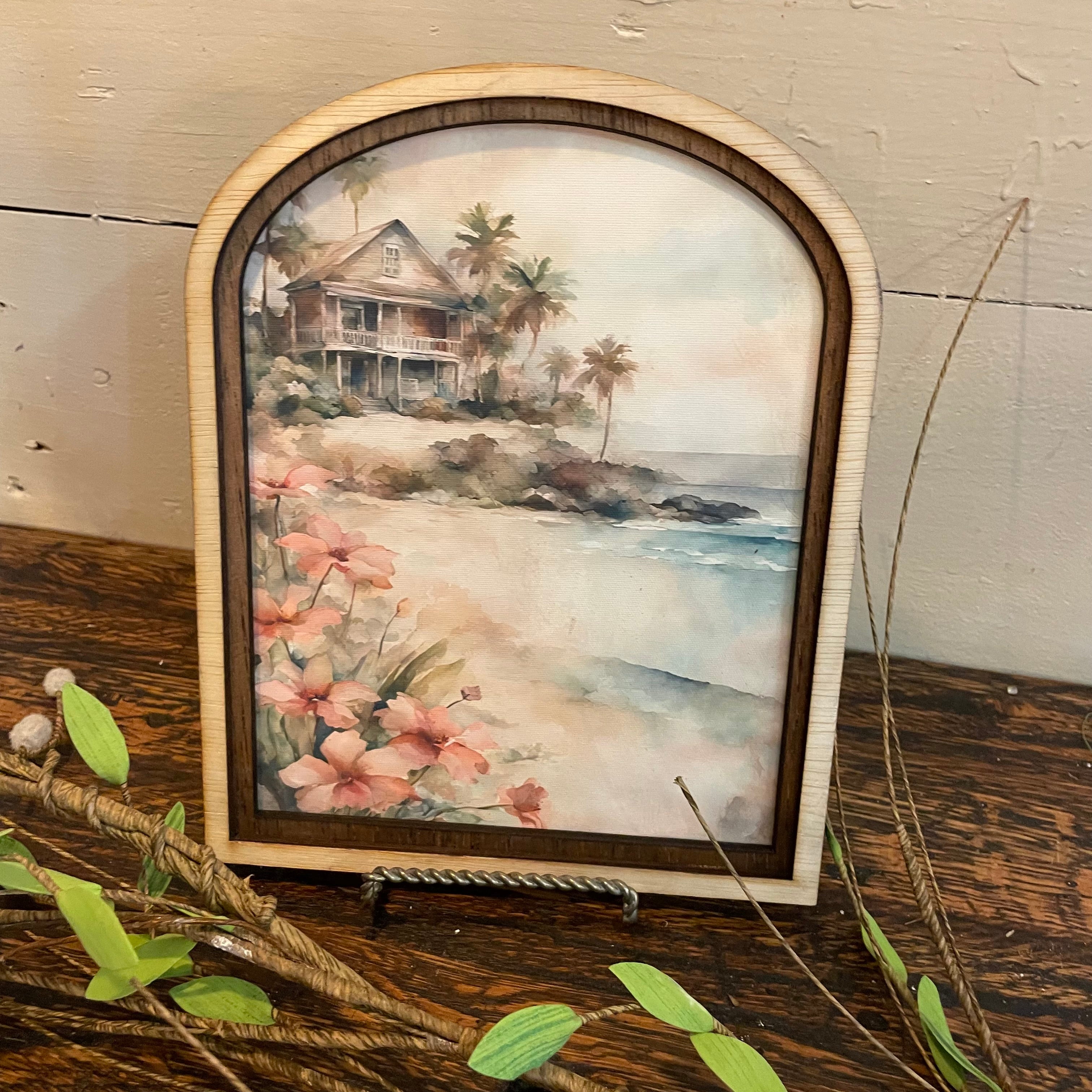 Cottage on the Beach with Pink Flowers