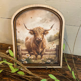 Highland Cow with daisies Canvas Print in Arched Frame