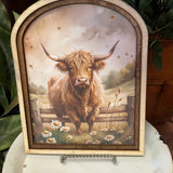 Highland Cow with daisies Canvas Print in Arched Frame