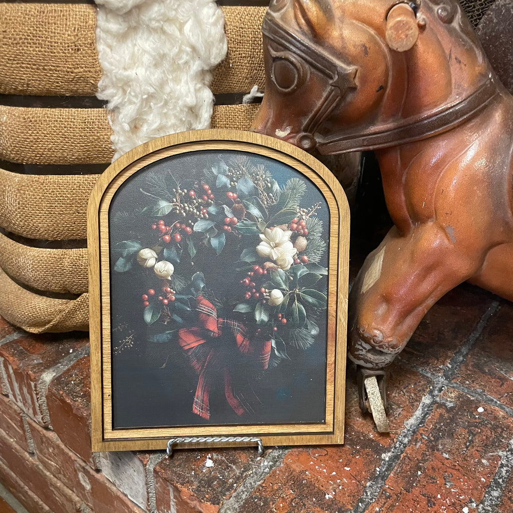 Wreath with plaid tartan ribbon framed in Small Arch