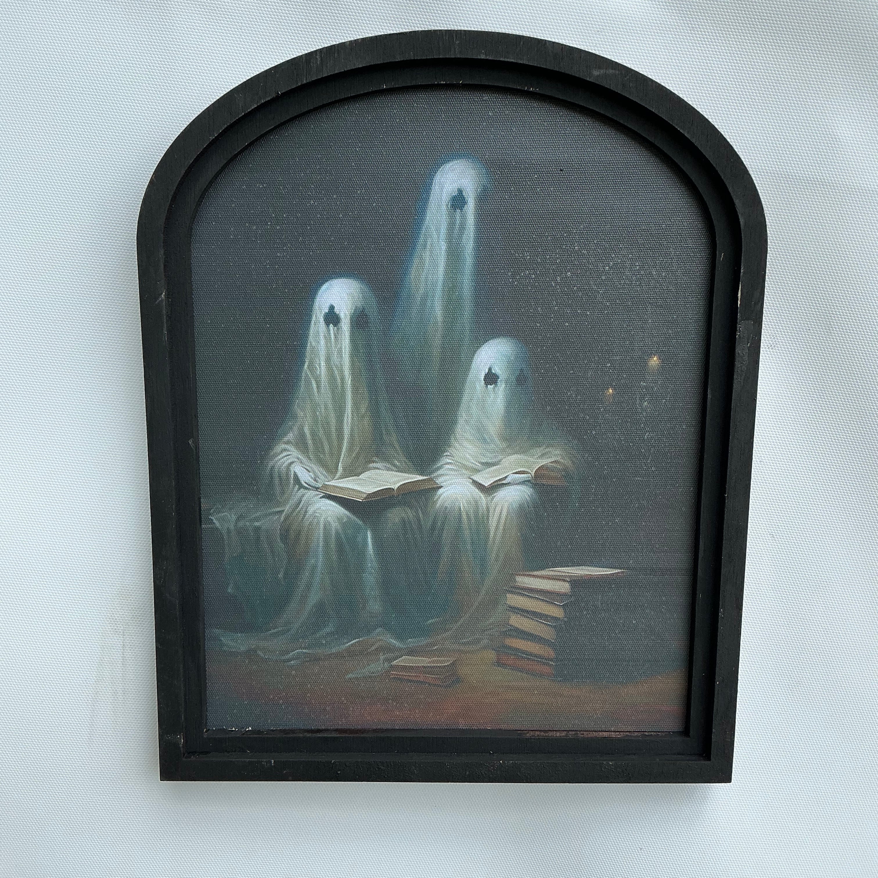Ghost Reading Canvas Print in Sm Arch Frame 