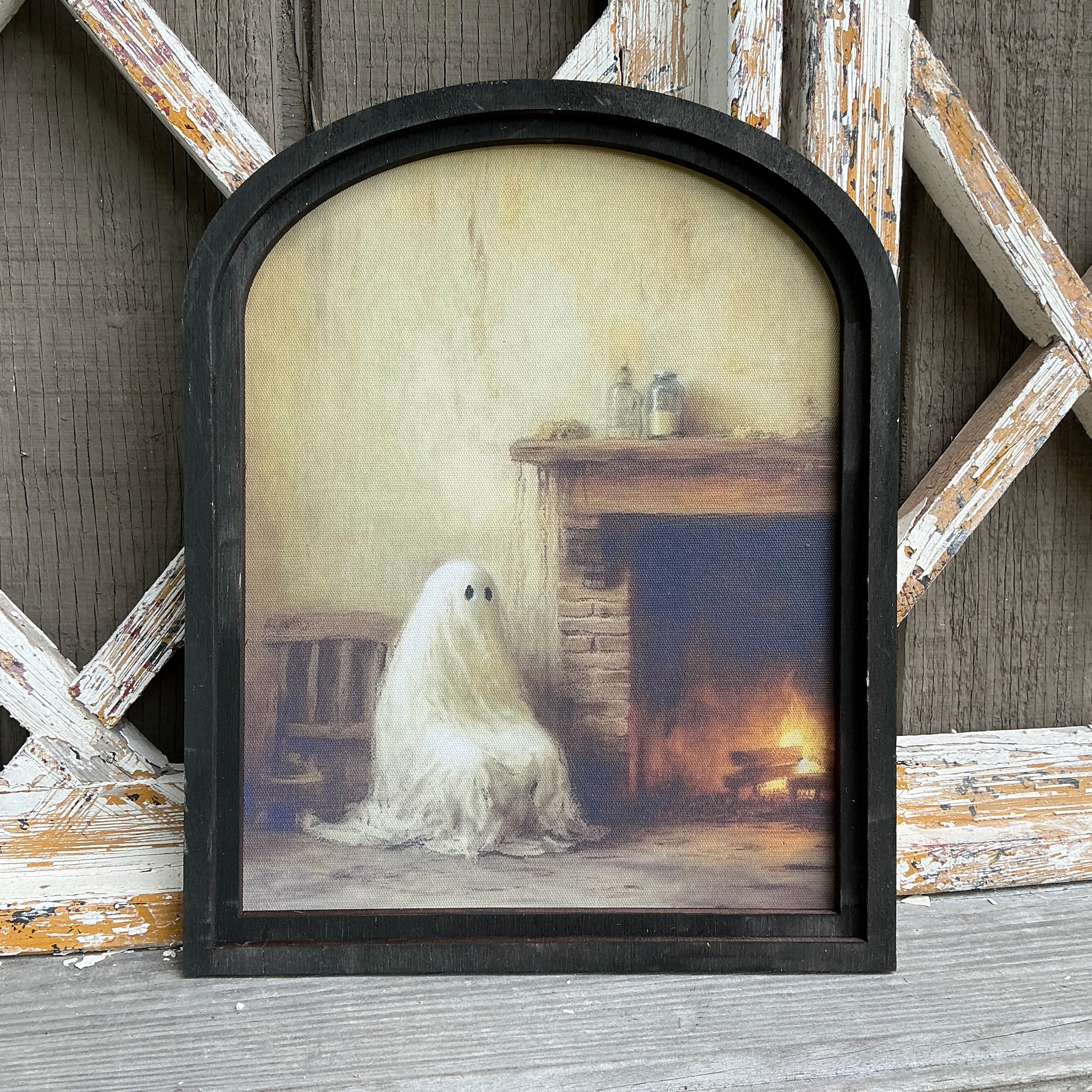 Ghost by the Fireplace Canvas Print in Small Arch Frame
