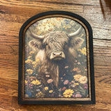 Highland Cow with flowers Canvas Print in Arched Frame
