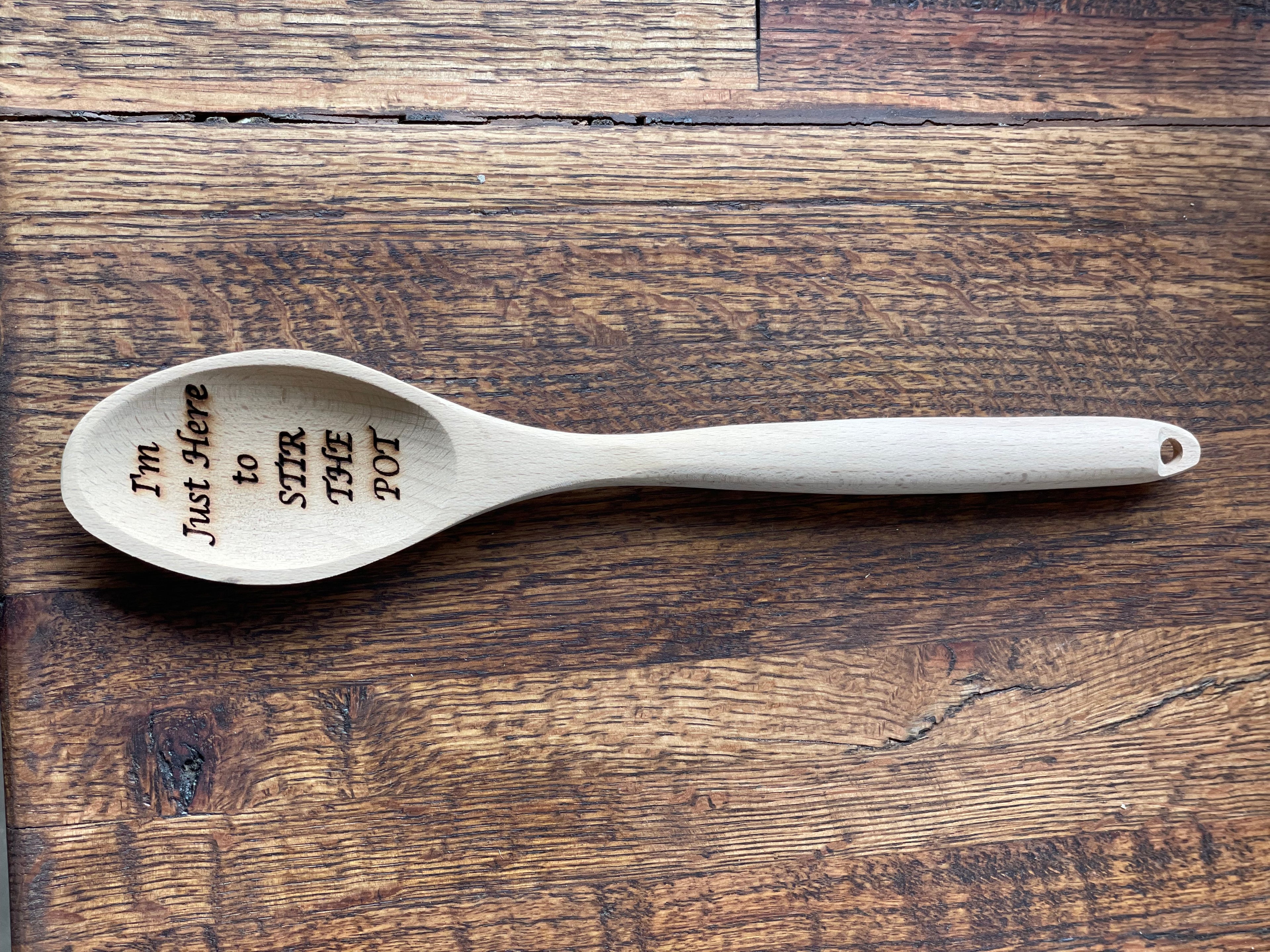 I'm just here to stir the pot wooden spoon