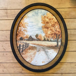 Autumn Barn with county road canvas print in oval frame
