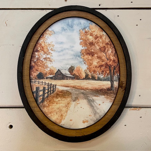 Autumn Barn with county road canvas print in oval frame