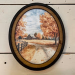 Autumn Barn with county road canvas print in oval frame