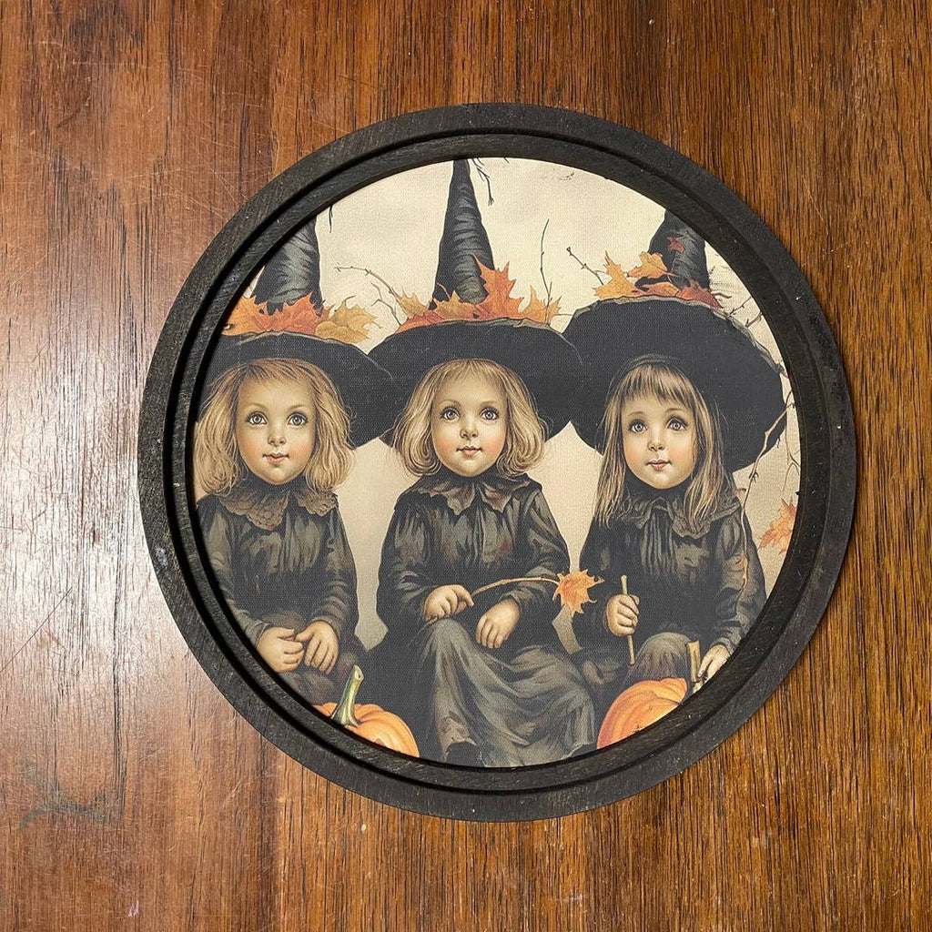 Three witches at Witch Academy Print in round frame
